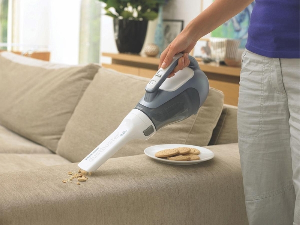  Cleaning the sofa with a vacuum cleaner