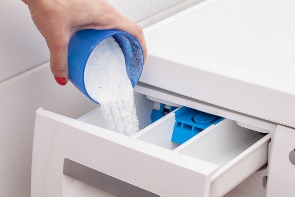  Loading detergent in a special tray