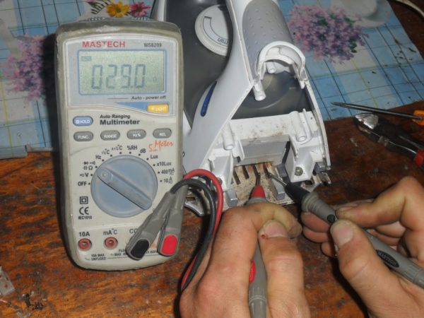  Repair of heating elements and iron thermostat