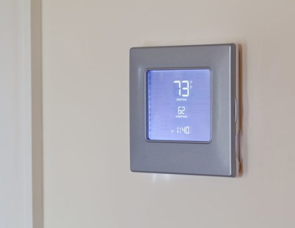  Electronic thermostat on the wall