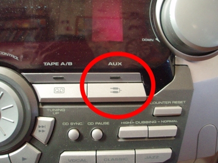  AUX button on the music center