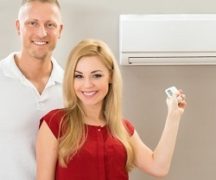  Man and woman near the air conditioner