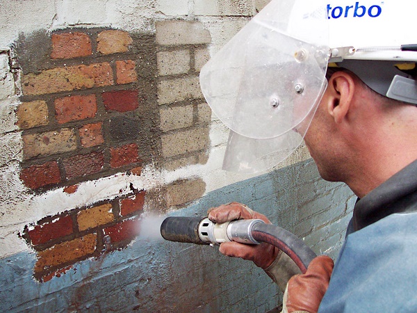  Sand blasting on stone