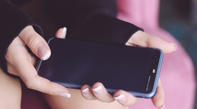  Smartphone in female hand